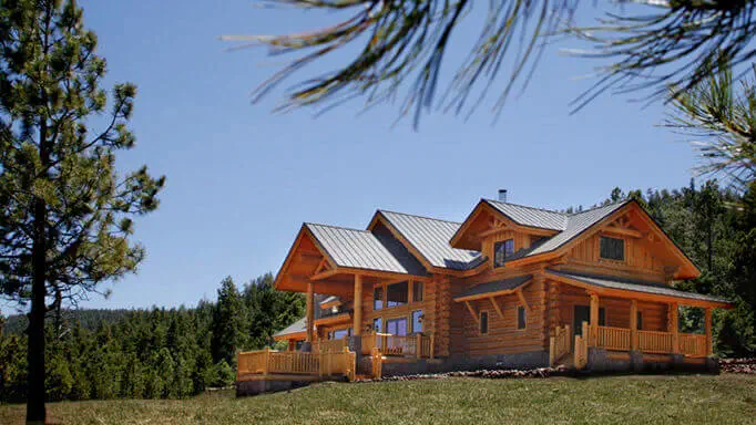 Custom log home at Hidden Meadow Ranch